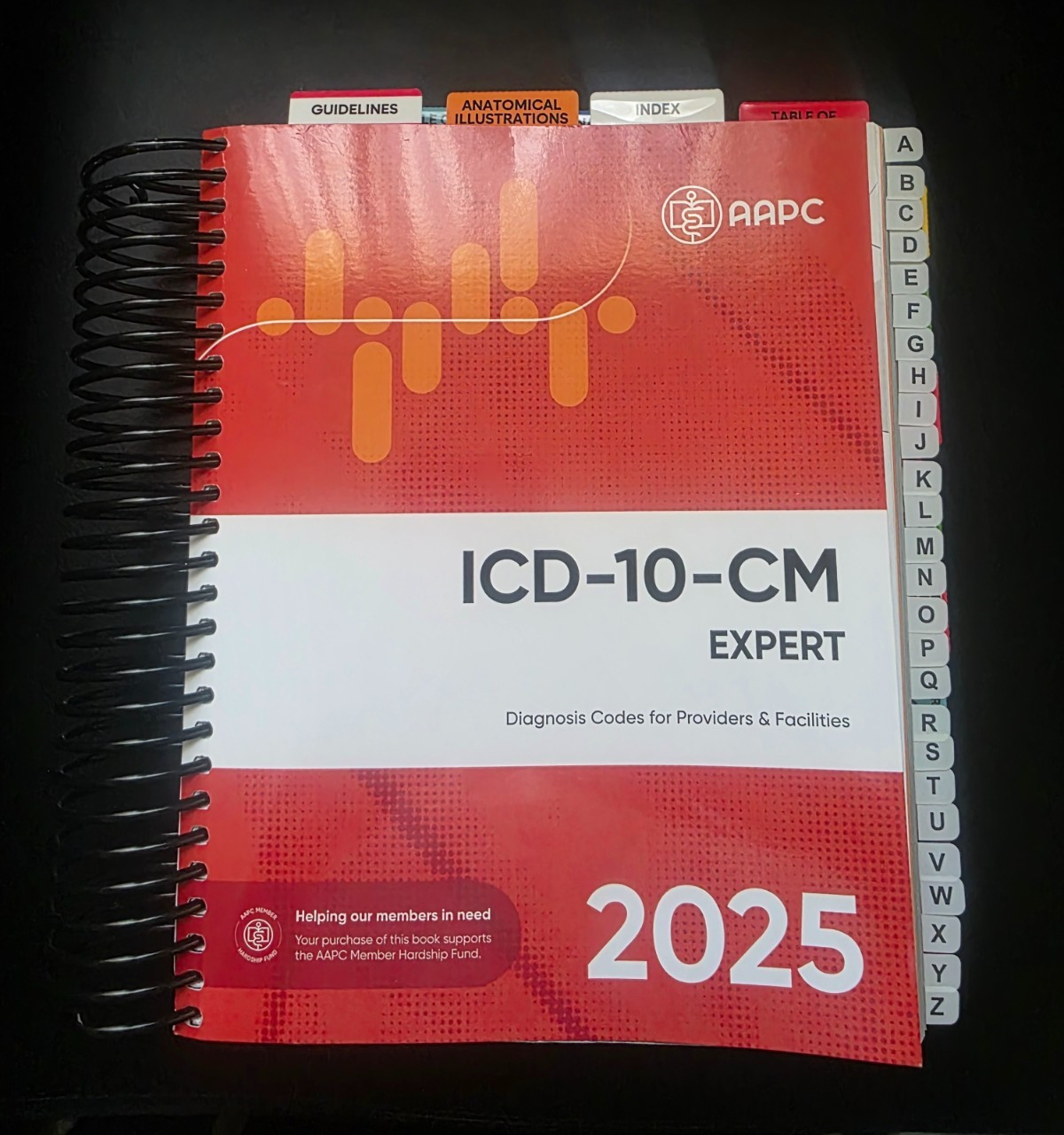 ICD-10-CM 2025 – Spiral-bound, by AAPC – Prepped with numerous notations